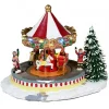 New Christmas Warehouse Kids Enjoying A Winter Fun Park Merry-Go-Round Christmas Village Scene - 23Cm