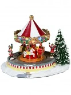 New Christmas Warehouse Kids Enjoying A Winter Fun Park Merry-Go-Round Christmas Village Scene - 23Cm