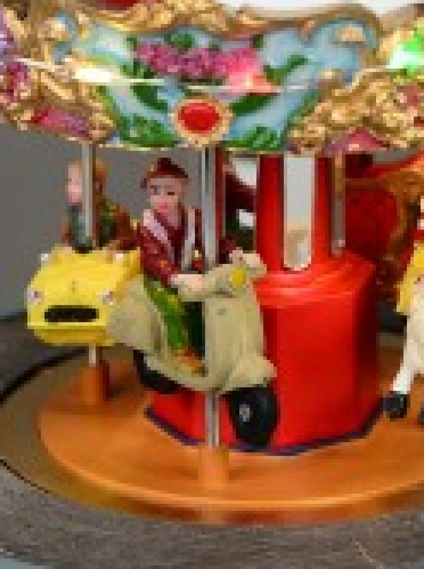 New Christmas Warehouse Kids Enjoying A Winter Fun Park Merry-Go-Round Christmas Village Scene - 23Cm